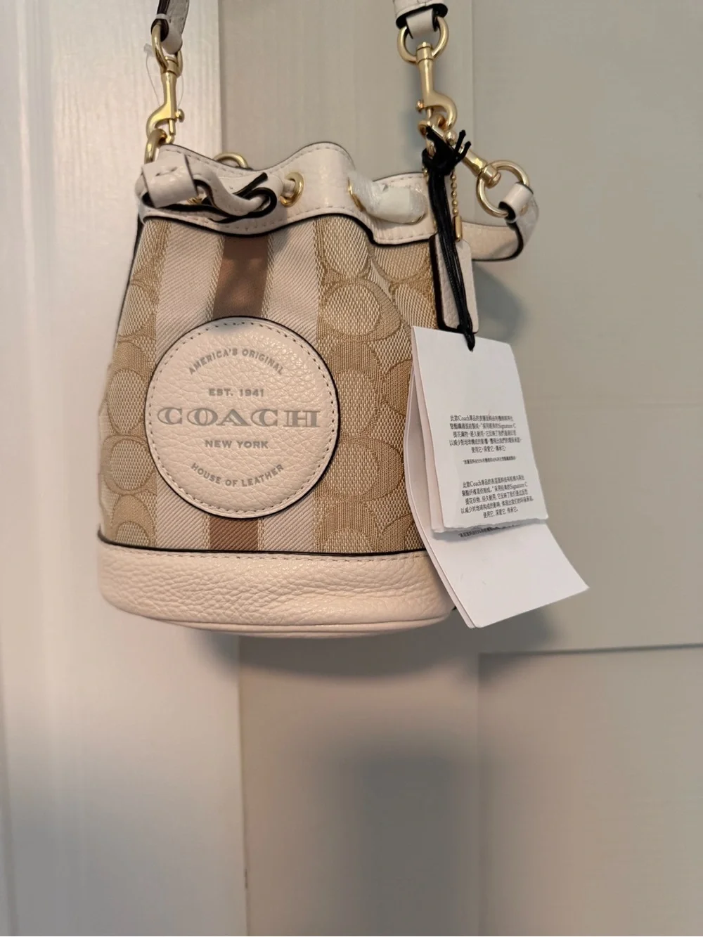 Coach Mini Dempsey Bucket Bag in Beige and White with Signature Logo